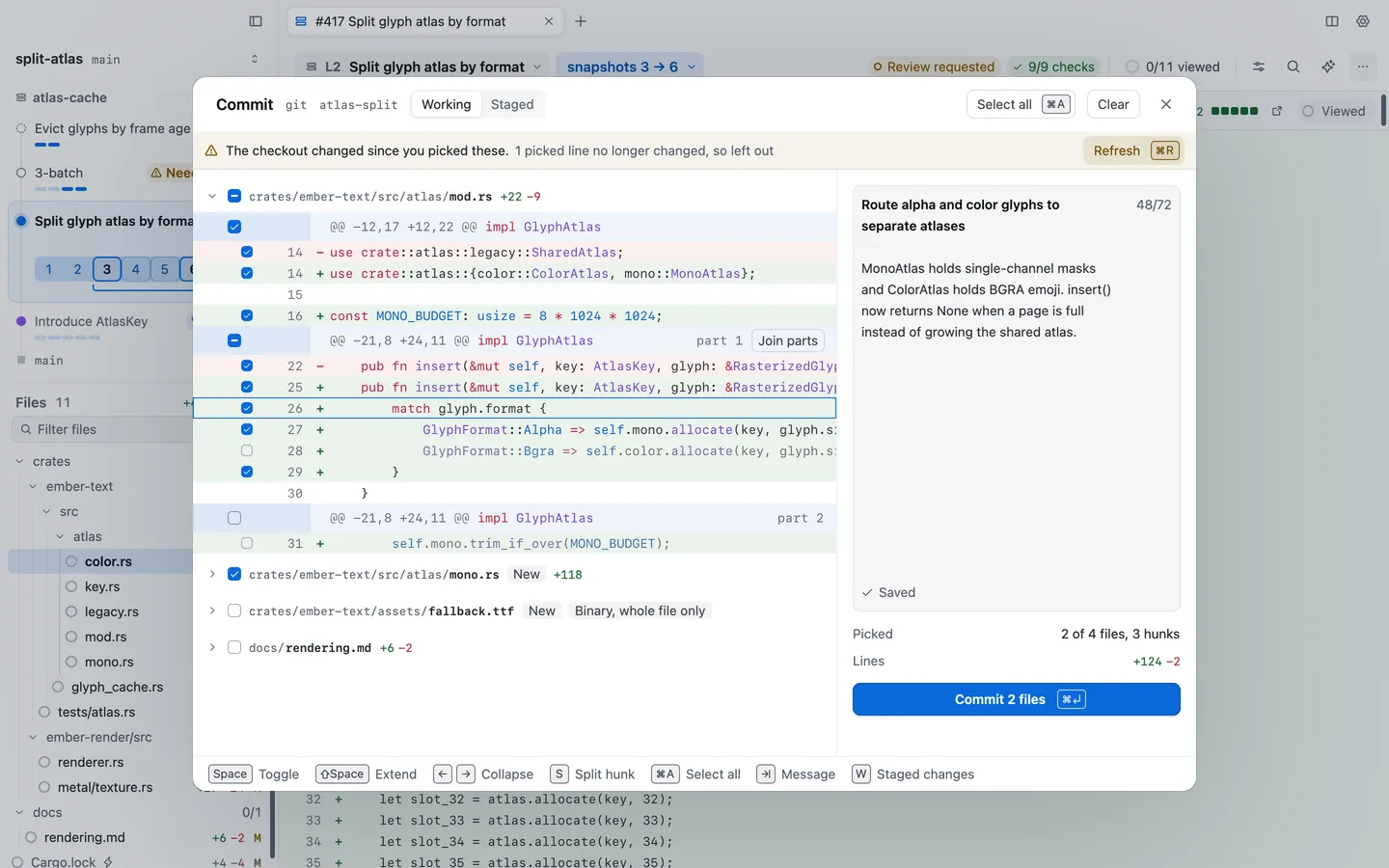 The commit sheet with two files picked, one hunk split into two parts, a commit message on the right and the Commit 2 files button